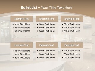 A Large Room With A Counter And Chairs PowerPoint Template