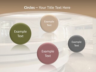 A Large Room With A Counter And Chairs PowerPoint Template