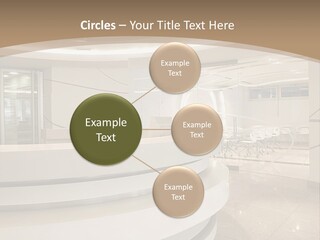 A Large Room With A Counter And Chairs PowerPoint Template