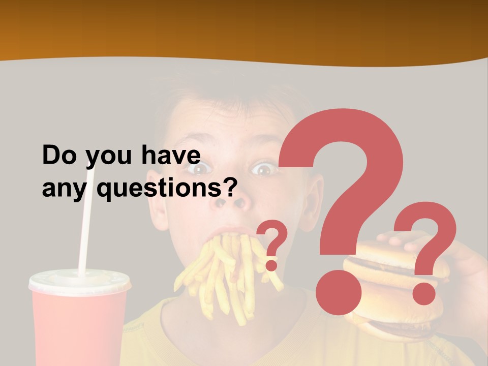 A Young Boy Is Eating A Hamburger And Fries PowerPoint Template