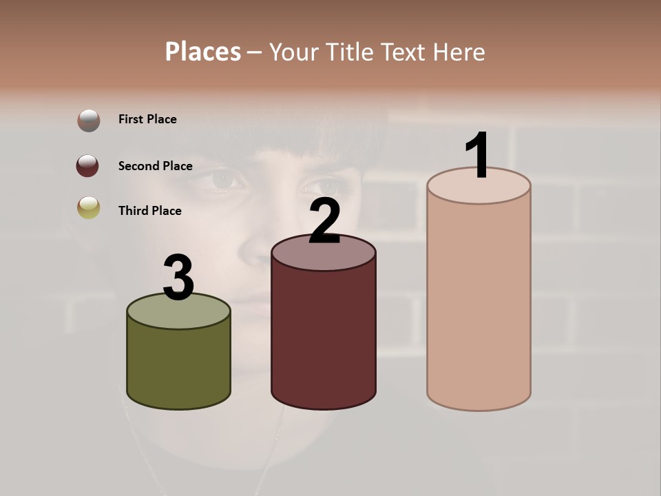 A Young Boy Is Looking At The Camera With A Brick Wall Behind Him PowerPoint Template