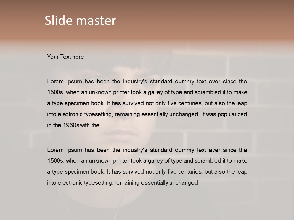 A Young Boy Is Looking At The Camera With A Brick Wall Behind Him PowerPoint Template