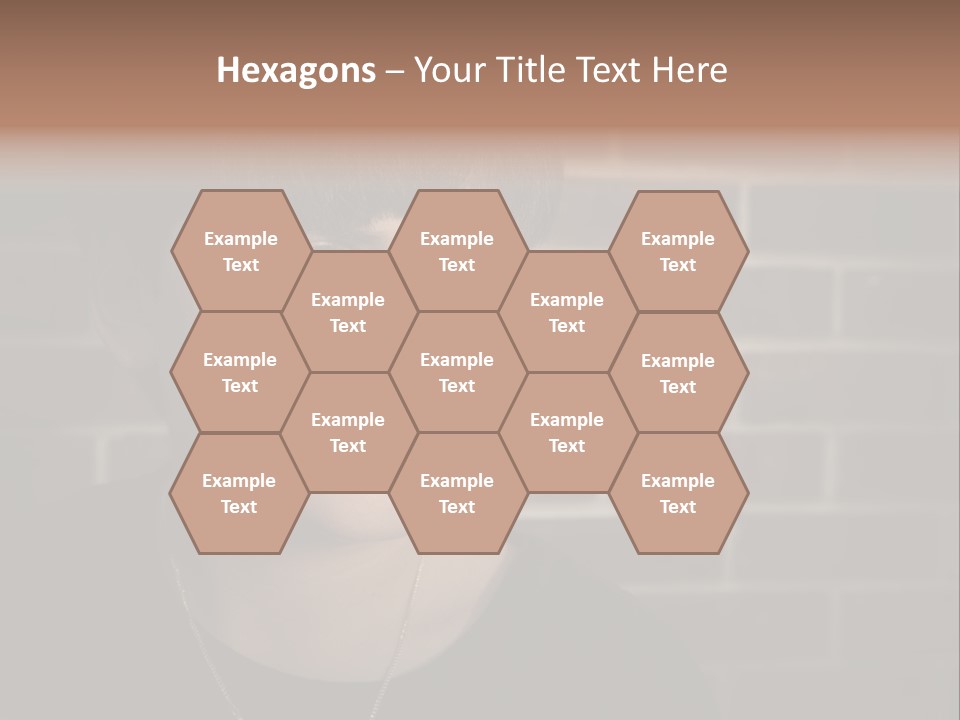 A Young Boy Is Looking At The Camera With A Brick Wall Behind Him PowerPoint Template