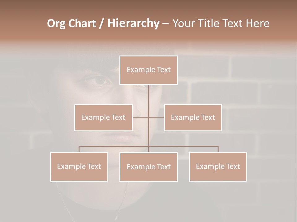 A Young Boy Is Looking At The Camera With A Brick Wall Behind Him PowerPoint Template