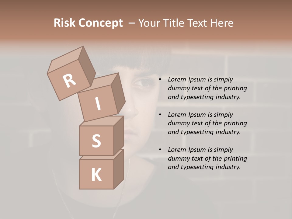 A Young Boy Is Looking At The Camera With A Brick Wall Behind Him PowerPoint Template