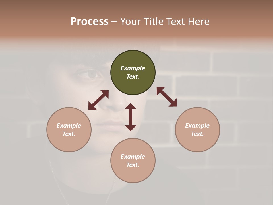 A Young Boy Is Looking At The Camera With A Brick Wall Behind Him PowerPoint Template