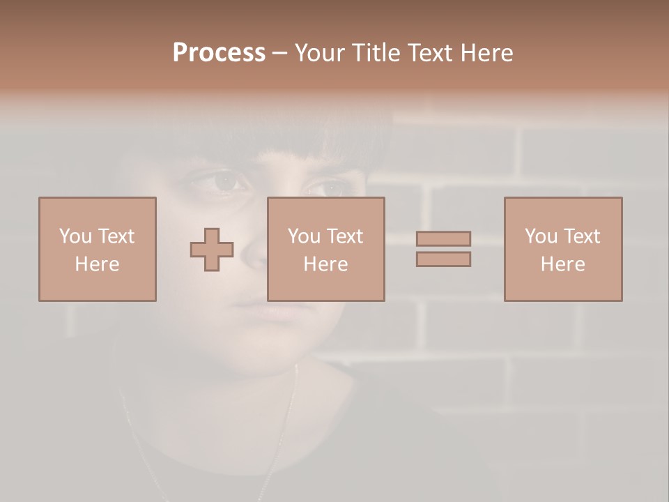 A Young Boy Is Looking At The Camera With A Brick Wall Behind Him PowerPoint Template