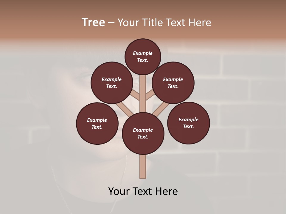 A Young Boy Is Looking At The Camera With A Brick Wall Behind Him PowerPoint Template