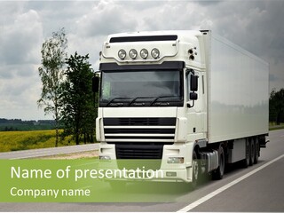 A Large White Truck Driving Down A Road PowerPoint Template