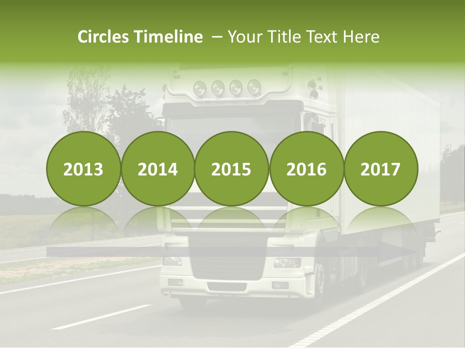 A Large White Truck Driving Down A Road PowerPoint Template