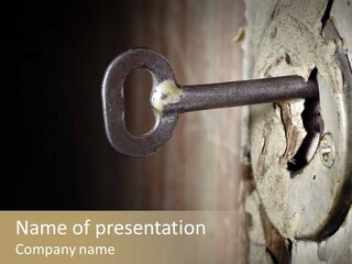 A Rusty Key On A Door With A Black Background PowerPoint Template