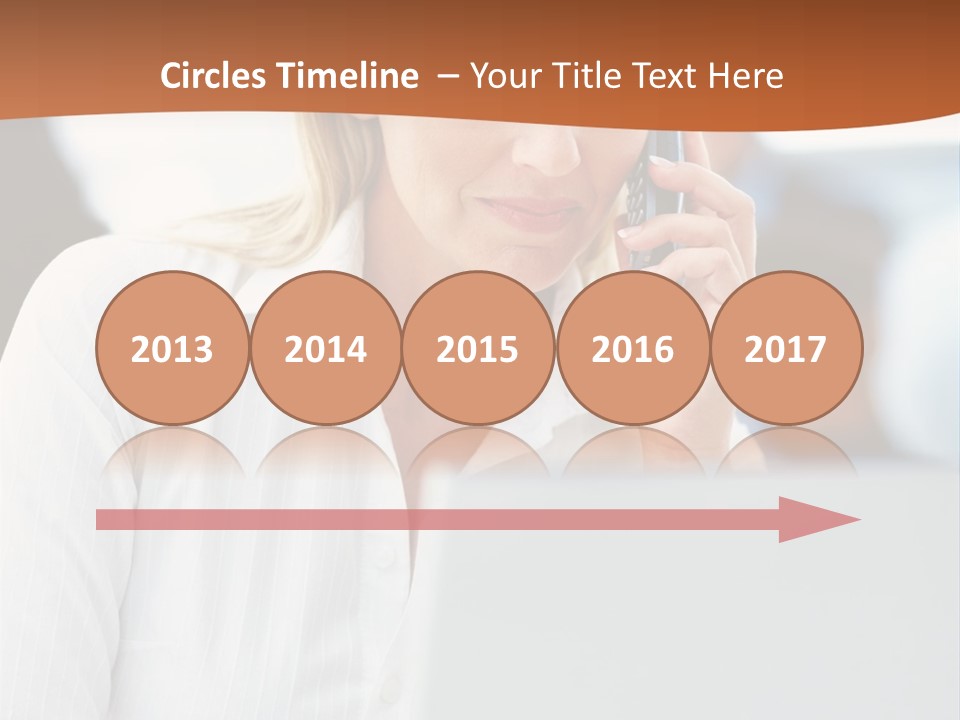 A Woman Talking On A Cell Phone In Front Of A Laptop PowerPoint Template