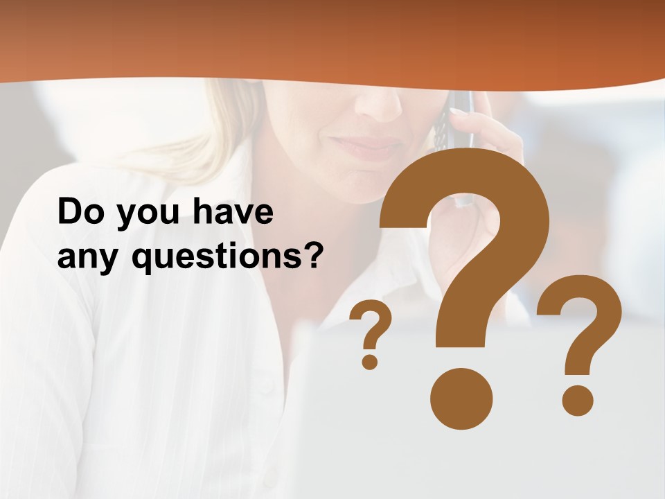 A Woman Talking On A Cell Phone In Front Of A Laptop PowerPoint Template