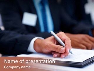 A Person Writing On A Piece Of Paper With A Pen PowerPoint Template