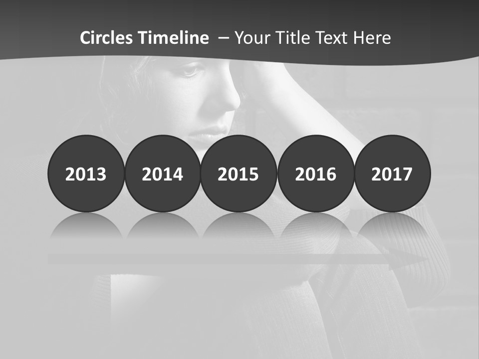 A Woman Sitting In Front Of A Brick Wall With Her Hands On Her Head PowerPoint Template