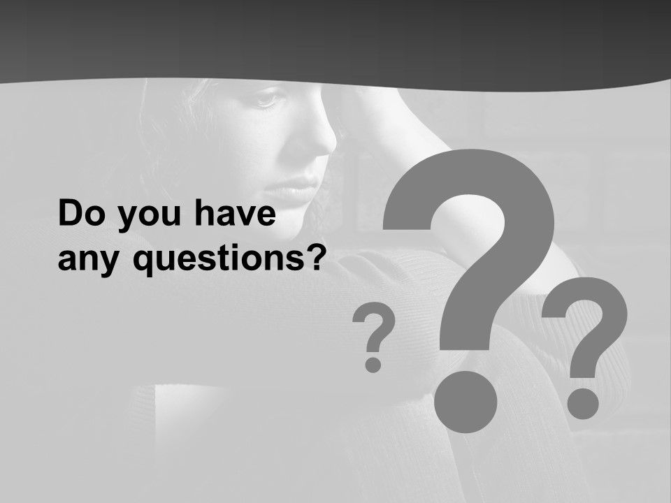 A Woman Sitting In Front Of A Brick Wall With Her Hands On Her Head PowerPoint Template