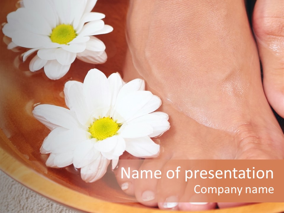 A Person's Feet In A Bowl Of Water With Daisies PowerPoint Template