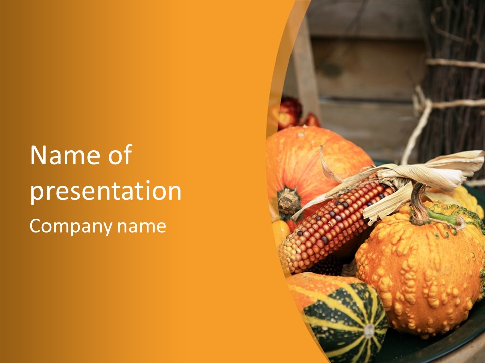 A Plate Of Pumpkins And Corn On A Table PowerPoint Template