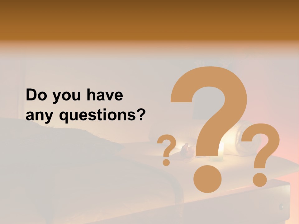 A Bed With A Pillow And A Candle On It PowerPoint Template