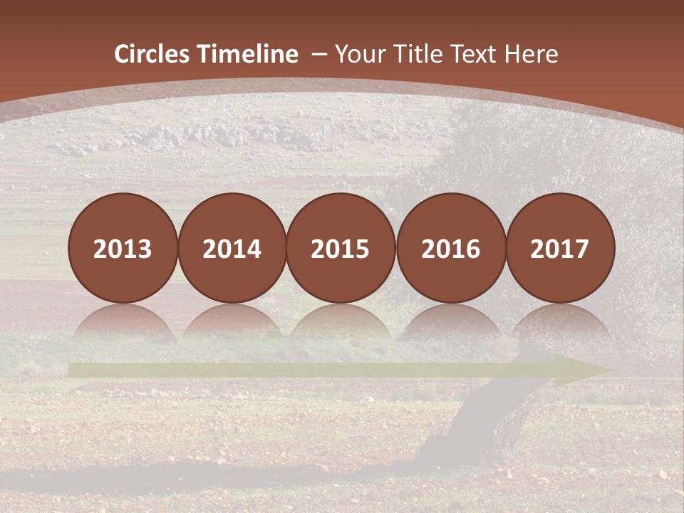 A Tree In A Field With A Mountain In The Background PowerPoint Template