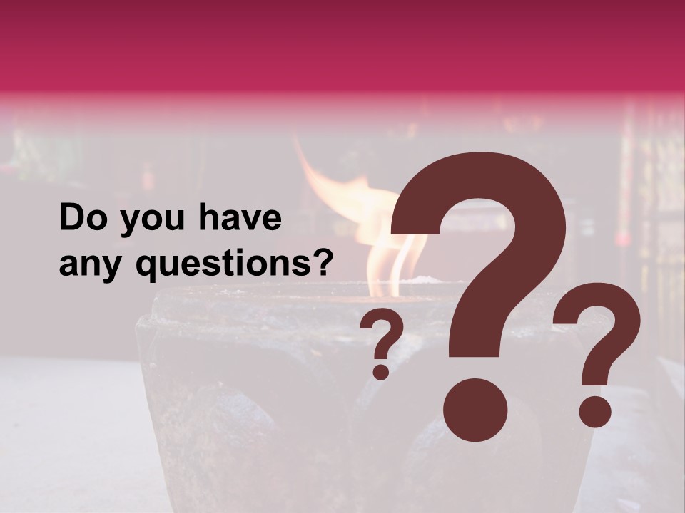 A Candle That Is Sitting On A Table PowerPoint Template