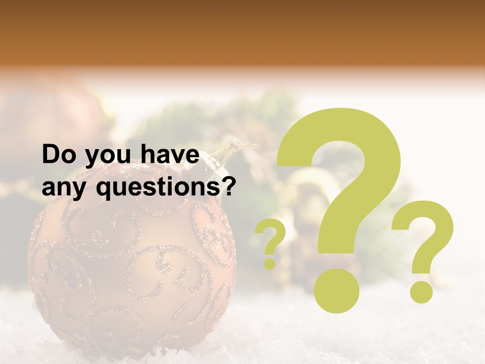 A Christmas Ornament Sitting In The Snow PowerPoint Template