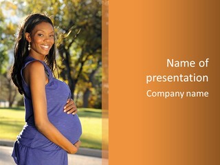 A Pregnant Woman In A Blue Dress Is Smiling PowerPoint Template