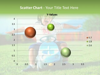 A Young Boy Riding A Toy Car In The Grass PowerPoint Template