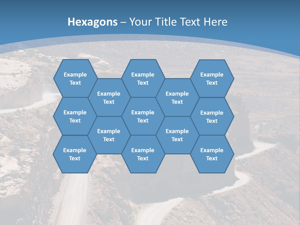 A Scenic View Of A Canyon With A Road Going Through It PowerPoint Template