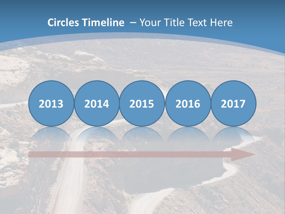 A Scenic View Of A Canyon With A Road Going Through It PowerPoint Template