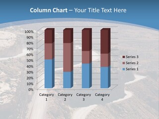 A Scenic View Of A Canyon With A Road Going Through It PowerPoint Template