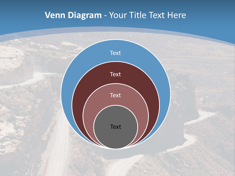 A Scenic View Of A Canyon With A Road Going Through It PowerPoint Template