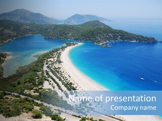 An Aerial View Of A Beach With A Boat In The Water PowerPoint Template