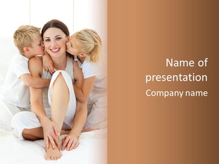 A Woman And Two Children Are Sitting On A Bed PowerPoint Template