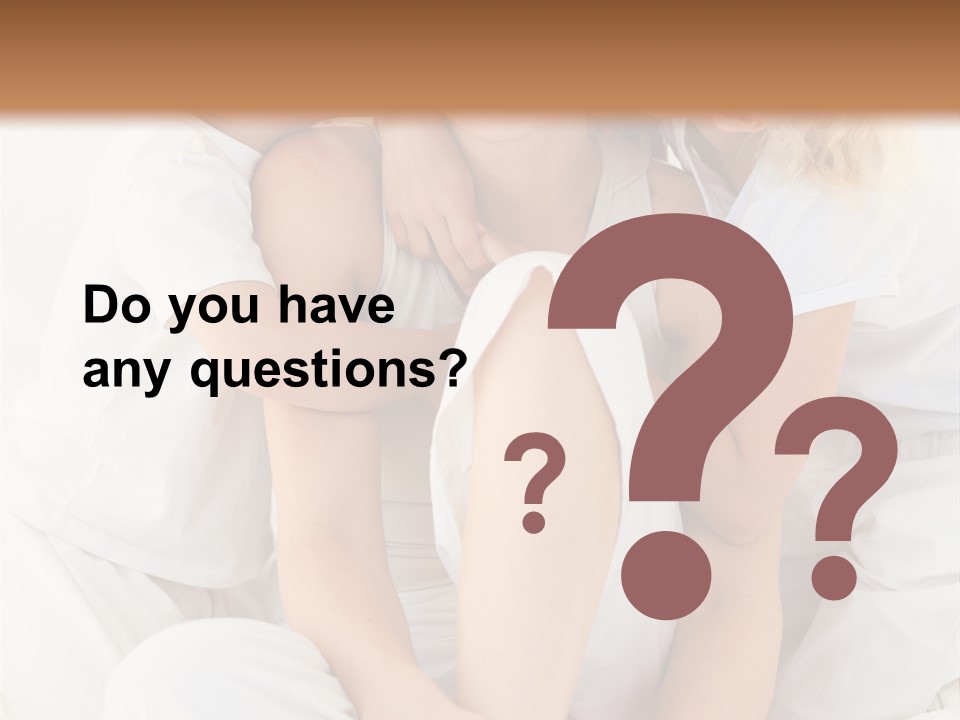 A Woman And Two Children Are Sitting On A Bed PowerPoint Template