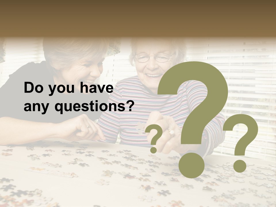 An Elderly Woman And A Young Woman Playing With A Puzzle PowerPoint Template