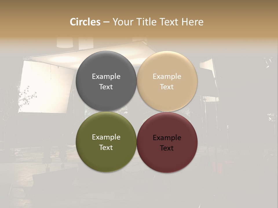 A Photo Studio With A Large Screen And Lighting Equipment PowerPoint Template