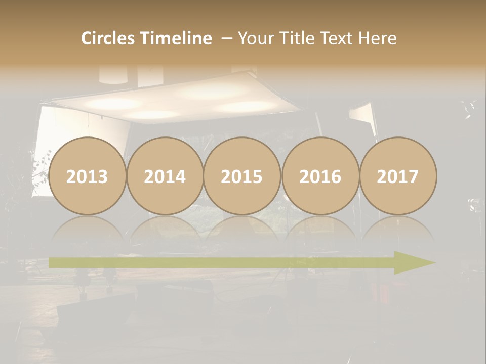 A Photo Studio With A Large Screen And Lighting Equipment PowerPoint Template