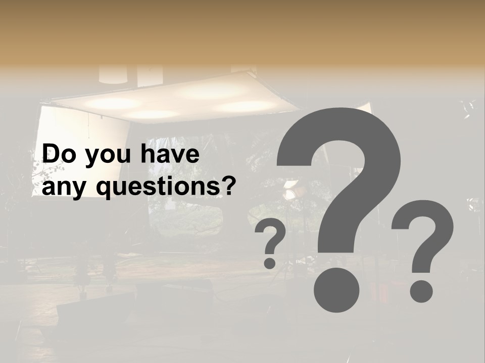 A Photo Studio With A Large Screen And Lighting Equipment PowerPoint Template