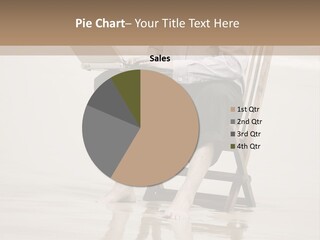 A Person Sitting On A Chair With A Laptop PowerPoint Template