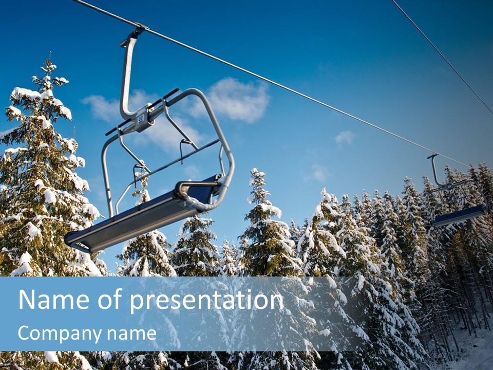 A Ski Lift With Trees In The Background PowerPoint Template