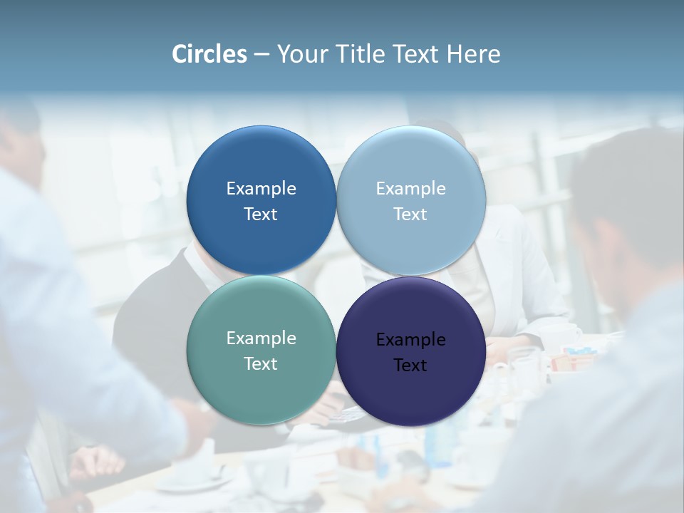 A Group Of Business People Sitting Around A Table PowerPoint Template