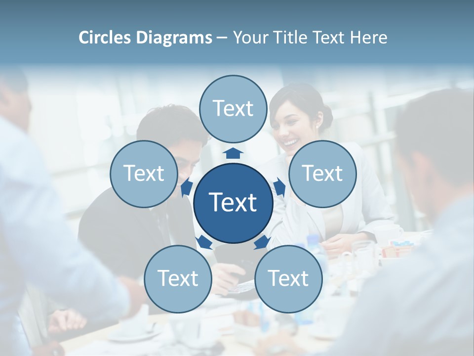 A Group Of Business People Sitting Around A Table PowerPoint Template