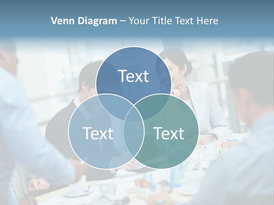 A Group Of Business People Sitting Around A Table PowerPoint Template