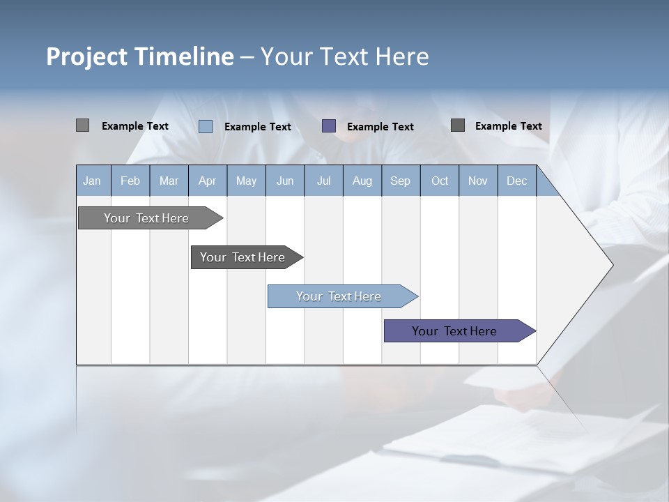 A Man And A Woman Sitting At A Table Looking At A Computer Screen PowerPoint Template