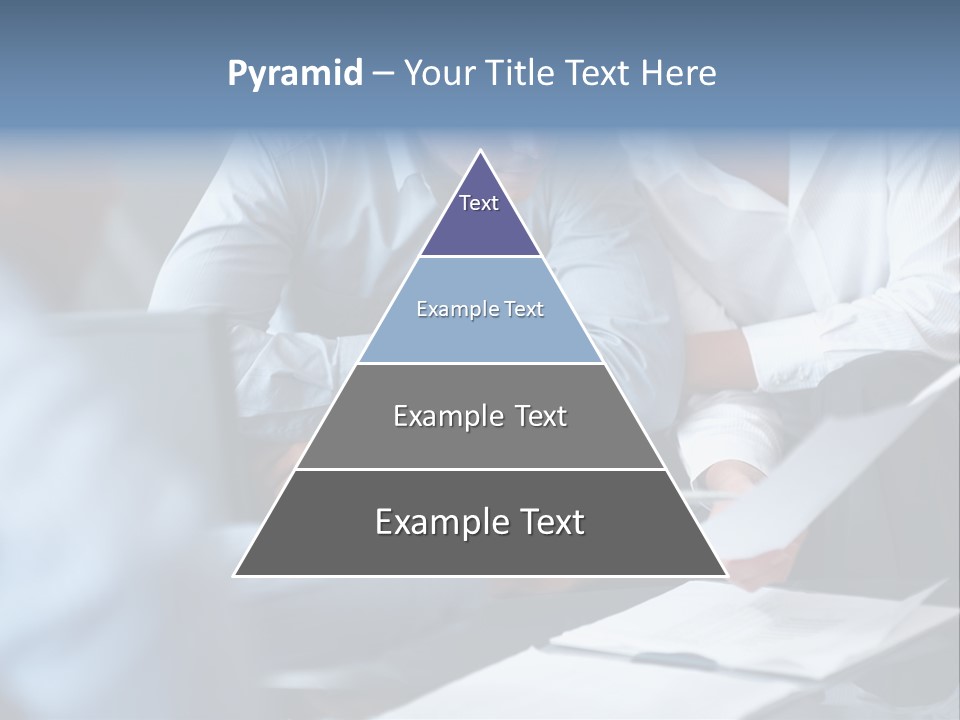 A Man And A Woman Sitting At A Table Looking At A Computer Screen PowerPoint Template