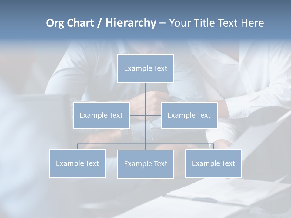 A Man And A Woman Sitting At A Table Looking At A Computer Screen PowerPoint Template
