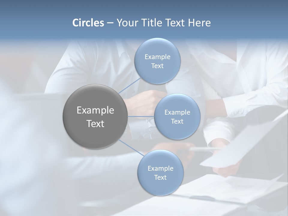 A Man And A Woman Sitting At A Table Looking At A Computer Screen PowerPoint Template