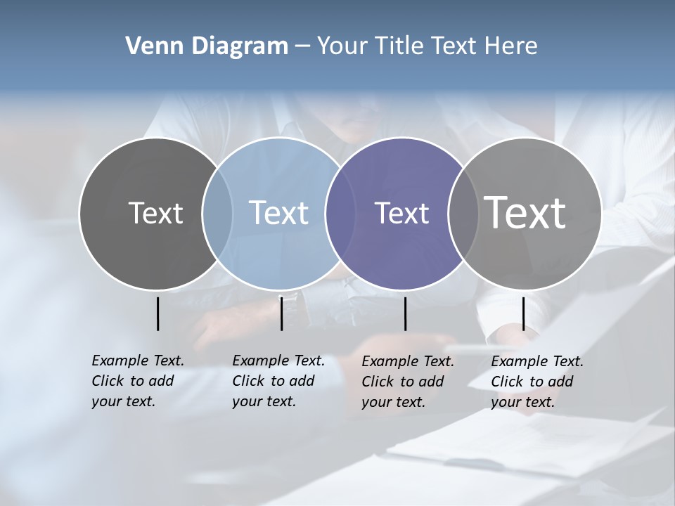 A Man And A Woman Sitting At A Table Looking At A Computer Screen PowerPoint Template