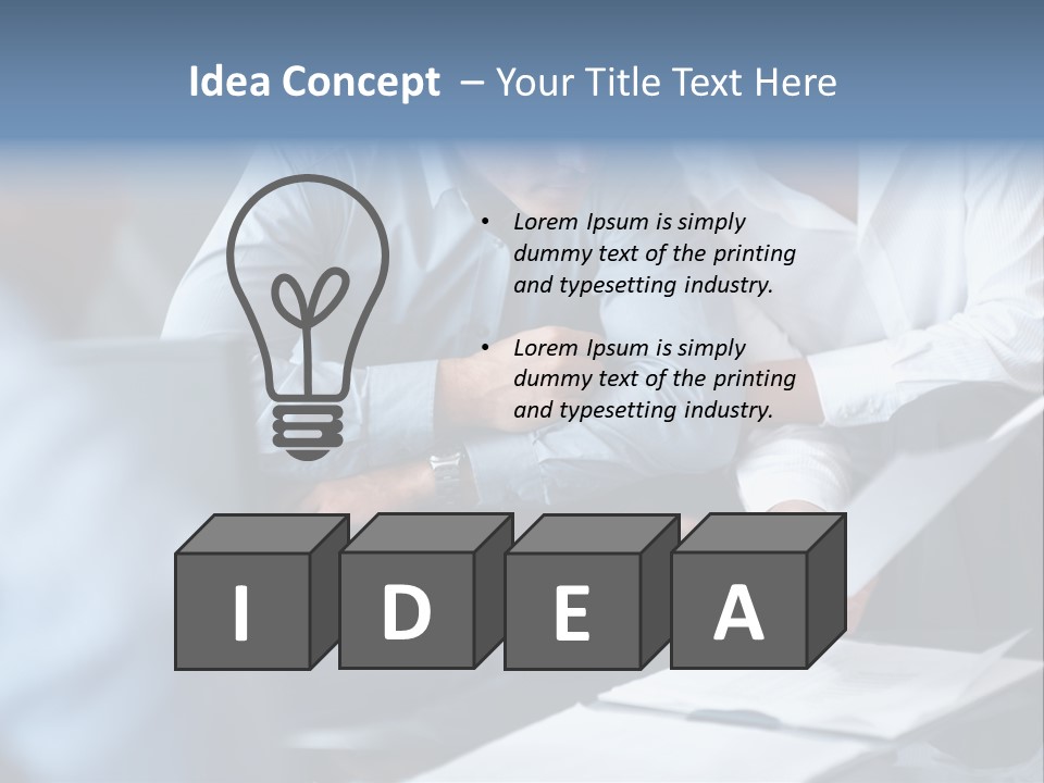 A Man And A Woman Sitting At A Table Looking At A Computer Screen PowerPoint Template